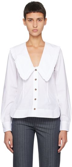 Organic cotton poplin shirt. · Ruffle trim at pointed Peter Pan collar · V-neck · Button closure · Vented side seams · Two-button barrel cuffs Supplier color: Bright white Pointed Collar Shirt, Peter Pan Collar Shirt, Cotton Poplin Shirt, Women Shirts Blouse, Poplin Shirt, Pan Collar, Peter Pan Collar, Neck Shirt, Ruffle Trim