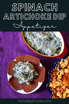 spinach artichoke dip appetizer with crackers on the side