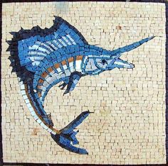 a blue marlin fish is depicted in this mosaic tile art work on the wall