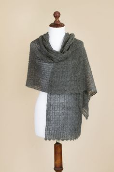 This charcoal grey shawl by Raquel and Gregor is designed with feminine elegance. Knit with luxurious baby alpaca the fine wool from the alpaca's first shear the lightweight wrap features sheer lacy textures and a scalloped border. Black Leggings Style, Handwoven Shawls, Rainbow Scarf, Herringbone Design, Knit Alpaca, Sweater Knitting Patterns, Winter Scarf, Charcoal Grey, Alpaca