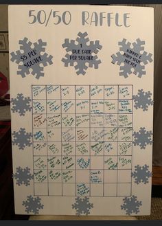 a poster with snowflakes on it that says 50 / 50 raffle and has been written all over the place