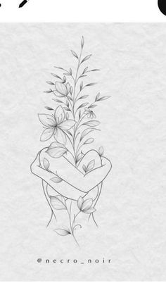 a tattoo design with flowers and leaves on it's side, in black ink