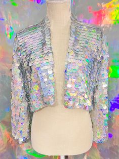 Perfect for music festivals and nights out with friends! All jackets are handmade with love and ready to ship in 1-3 days. Size chart in photos. Crop jacket length 16-18 inches. If you would like a custom Size/ Length, color, and lining please use this link below. DESIGN YOUR OWN * Custom Confetti Jacket *More colors available! https://www.glittertrove.com/listing/1028062548/custom-size-sword-sequin-jacket-sequin Please advise, Must be worn with care. Sequins may fall out if tugged or worn rough Tinsel Jacket, Glitter Jacket, 70s Jacket, Sequin Kimono, Custom Confetti, Silver Holographic, Sequin Blazer, Disco Outfit, Sequin Jacket