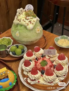 there are many desserts on the table with fruit in bowls and plates around them