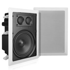 a pair of speakers sitting next to each other on top of a white wall mounted speaker