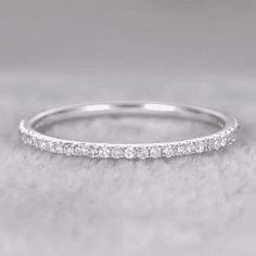 a white gold wedding band with diamonds