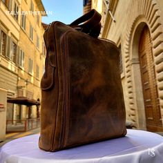 This Italian leather Backpack is a true masterpiece of craftsmanship. Handmade in Florence, Italy, it combines luxurious materials and exquisite attention to detail. Elevate your style and travel in sophistication with this elegant backpack. . Size: Height 44cm/17.4 inch Width 32cm/12.6 inch Depth 12cm/4.8 inch . The story of this backpack: In the vibrant city of Florence, Italy, a small artisan workshop nestled amidst the cobblestone streets hummed with creativity and passion. Here, a skilled craftsman named Alessio dedicated himself to the art of crafting exquisite handmade leather goods. His attention to detail and commitment to quality resulted in remarkable creations, including a collection of leather backpacks that were both functional and stylish computer bag notebook backpack. One Luxury Leather Backpack For Travel In Cognac, Luxury Cognac Leather Backpack For Travel, Luxury Cognac Leather Travel Backpack, Elegant Brown Backpack With Leather Backing, Luxury Leather-backed Backpack For Daily Use, Luxury Backpack With Leather Backing For Daily Use, Brown Leather Backpack For Formal Occasions, Luxury Business Backpack In Soft Leather, Classic Brown Backpack For Formal Occasions