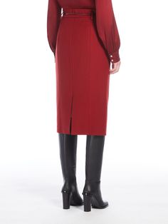 Find MAX MARA Wool Pencil Skirt on Editorialist. Midi skirt made of exquisite pure wool drap. Lined garment featuring a pencil silhouette with slant pockets on the sides and central vent on the back. Features belt loops and a matching belt to accentuate the waist. Back zip fastening. Asymmetrical Pencil Skirt For Office In Fall, Fall Office Asymmetrical Pencil Skirt, Elegant Midi Pencil Skirt For Work, Classic Asymmetrical Skirt For Work, Elegant Winter Pencil Skirt, Elegant Midi Skirt For Workwear, Elegant Winter Midi Bottoms, Elegant Midi Length Bottoms For Winter, Elegant Midi Length Winter Bottoms