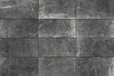 black and white marble tiles are arranged in four different rows, each with an interesting pattern