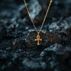 This solid gold key of Ankh necklace showcases exquisite craftsmanship, symbolizing life and spirituality. The key of Ankh pendant is more than just jewelry; it's a fine representation of ancient Egyptian elegance and the timeless allure of this sacred symbol. PENDANT INFORMATIONThis pendant is made of real, solid gold.• Made in USA• Size: MINI• Material: 14k or 18k solid gold• Finish: polished• Height: 1.2" (30,5 mm) x Width: 0.8" (20 mm)• Pendant weight (approx.): 3 grams (14k)• Bail: fits up Ankh Pendant, Ankh Necklace, Phoenix Pendant, Gold Key, Gold Dragon, Solid Gold Chains, Mini Pendants, Dragon Pendant, Yellow Gold Pendants