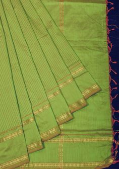 Product: ~9 yards saree in mercerized cotton, no blouse piece A traditional saree for your wedding, something that would remind you of your mother, something that your daughter would carry on after you!! A legacy is what this is. This richly hued saree with checks is the one! Fun fact: did you know that the 9 yards saree is said to be the oldest kind of saree and finds mention in the Rig Veda itself? A saree which is simple yet festive and used for a lot of occasions over the years is a perfect 9 Yards Saree, Rig Veda, Checks Pattern, Traditional Saree, Green Tone, Silk Sarees Online, Traditional Sarees, Green Tones, Vibrant Green