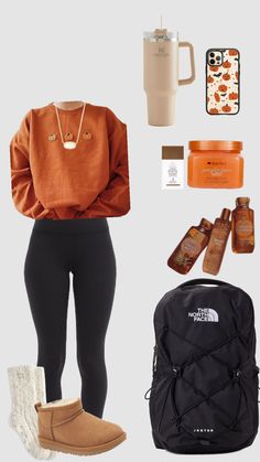 a woman in black leggings and an orange sweater