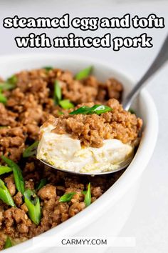 an egg and tofu dish with minced pork is shown in a white bowl