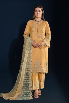 Dusty Yellow Embellished Pakistani Salwar Kameez Dupatta is artfully enriched with contrasted embroidery, hand adda embellishments, crystal like buttons. Yellow Punjabi Suit, Punjabi Suits Party Wear, Dusty Yellow, Hanging Tassels, Dusty Brown, Embroidery Suits Punjabi, Pakistani Salwar, Raw Silk Fabric, Dress Salwar Kameez