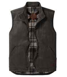 a vest with a plaid shirt underneath it