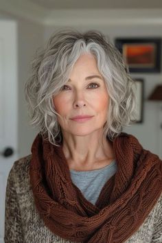 Draw inspiration from iconic shag looks that have stood the test of time, adapting these classic styles for a modern-day twist. Medium Grey Hair Styles, Silver Shag Hairstyles, Gray Wavy Shag Haircut, Shag For Fine Hair Over 50, Grey Hair Shag Over 50, Long Pixie Grey Hair, Fine Grey Hair Styles Over 50, Wolf Cut Older Women, Gray Shag Hairstyles Over 50