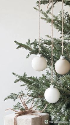 a christmas tree with ornaments hanging from it