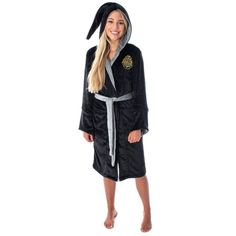 If youre looking for licensed Harry Potter merchandise, youve come to the right place! Intimo specializes in creating officially licensed childrens apparel that is comfortable, practical, and fun. This Harry Potter plush bathrobe is made of soft, polyester that will keep you comfortable and warm whether you are getting out of the shower or using it as a costume. It comes in a range of sizes to fit you or your Harry Potter fan perfectly and is designed for women's juniors. You can choose from 4 different designs: Gryffindor, Ravenclaw, Hufflepuff, or Slytherin. Each robe features the house crest embroidered over the left chest, a long hood, a color to match the chosen Hogwarts house, a belt, and pockets. Such a stylish robe is sure to go a long way as a gift. Made from high-quality polyeste Harry Potter Plush, Plush Robe, Bath Robes, Harry Potter Style, Harry Potter Merchandise, Harry Potter Outfits, Classic Cartoon Characters, Most Popular Movies, Hogwarts Houses