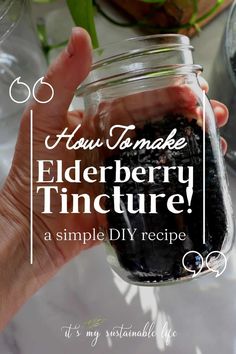 a hand holding a mason jar filled with elderberry tincture and text overlay reads how to make elderberry tincture a simple diy recipe