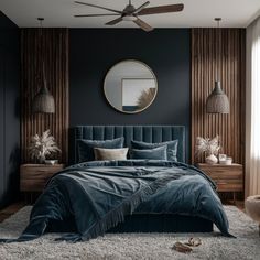 a bedroom with dark blue walls, white carpet and a round mirror on the wall