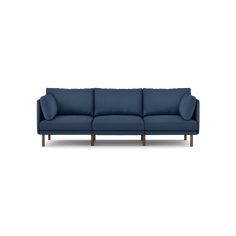 a blue couch with wooden legs on a white background