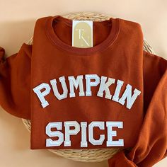 Cozy up with our Pumpkin Spice Crewneck Sweatshirt this fall season! It is also a great gift to your loved ones who loves fall season! - Sweatshirt is super soft and comfy! ♡ - Sweatshirt composition: 50% cotton, 50% polyester - All our sweatshirts run a unisex fit. They are naturally oversized, so we normally recommend your true size. But if you like a more baggy look, we recommend sizing up. - These letters are iron-on patched and is heat pressed, not embroidered. But rest assured they've been Fall Loungewear T-shirt, Fall T-shirt With Ribbed Cuffs And Relaxed Fit, Fall Relaxed Fit T-shirt With Ribbed Cuffs, College Letter Print T-shirt For Fall, Diy Fall Sweatshirts, Relaxed Fit School Spirit T-shirt For Fall, Fall Cotton T-shirt With Ribbed Cuffs, Ribbed Cuffs T-shirt For Fall Loungewear, Fall Varsity Sweatshirt