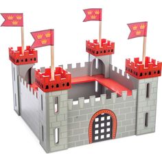 a castle with red flags sticking out of it