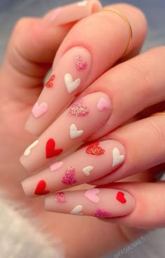 19. Love Heart Nude Coffin Valentine’s Day Nails With Valentine’s Day approaching. You have probably already been planning about Valentine’s day date ideas. Have you thought... Acrylic Nails Coffin