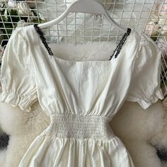 Sweet A line short dress fashion dress Material: blended Color: white Size(cm): S, M, L S length 108 bust 100 waist 56-94 M length 109 bust 104 waist 60-98 L length 110 bust 108 waist 64-102 White A-line Midi Dress With Fitted Bodice, Feminine White A-line Dress, Elegant White Short-sleeved Mini Dress, White Fit And Flare Mini Dress With Square Neck, White A-line Dress With Fitted Bodice, Elegant White Mini Dress With Short Sleeves, Chic White A-line Mini Dress, White A-line Mini Dress For Summer, White Fitted Summer Dress