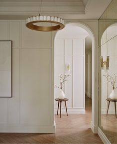 Making an entrance with our Avalon Chandelier, Roma Sconce and Mater Accent Table in this elegant Marylebone interior from Base Interior Design. 

Light emanates from the centerpiece chandelier through a precious ring of alabaster stone encased in satin brass or bronze. We love how the finishes and textures perfectly complement the soft herringbone floors and classical architecture. e look, while our modern accent table provides a bit of Chandelier Room, Herringbone Floors, Table Room, Modern Accent Tables, Alabaster Stone, Precious Rings, Herringbone Floor, Classical Architecture, Design Light