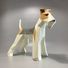 a dog made out of paper on a gray background