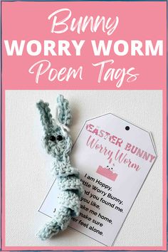 a crocheted bunny is sitting next to a tag that says bunny worry worm poem tags