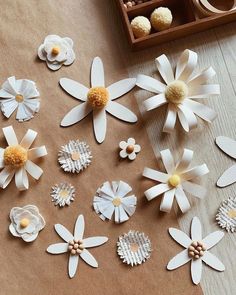 paper flowers are laid out on the table