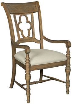 a wooden chair with white upholstered seat and armrests on an isolated white background