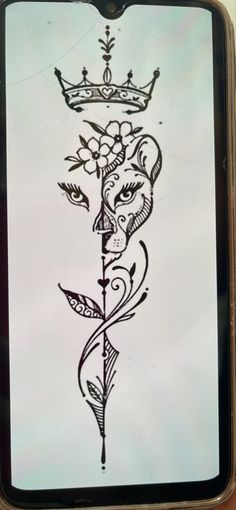 a stencil with a drawing of a snake and a crown on it's head