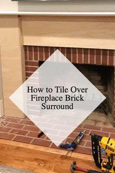 a brick fireplace with tools on the floor and an overlay that says how to tile over fireplace brick surround