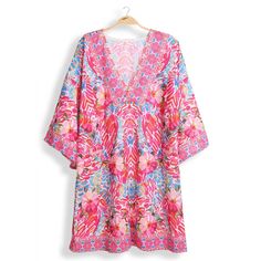 Floral Print Summer Cover-Up Keep your style fresh with this colorful cover-up dress! Perfect for summer, this floral print dress will add a touch of fun to any outfit. Plus, it's lightweight and comfortable, making it a convenient choice for all your warm-weather adventures. Show off your playful side with this must-have addition to your wardrobe.Floral Patterned Design - 30% Cotton, 70 Polyester - Perfect for Summer Beach/Vacation **Size- One Size Fits All** Summer Dresses With Colorful Pattern, Summer Multicolor Print Dresses For Beach Season, Summer Dresses With Multicolor Print For Beach Season, Summer Dresses In Multicolor Print For Beach Season, Multicolor Print Summer Vacation Dress, Multicolor Print Summer Dress For Vacation, Summer Vibrant Print Patterned Dress, Summer Vacation Dresses In Multicolor Print, Colorful V-neck Vacation Dress