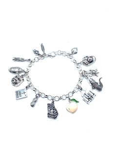 New. This Bracelet makes a perfect gift  has 14 Georgia themed Charms.  Stainless Steel bracelet has a lobster clasp closure measures approx 8" bracelet and charms are silver tone alloy and steel. Charms measure approx 1/2" - 1" in size charms include Feather, Dreamcatcher, Soda Bottle (famous soda was born in Georgia), Football, Bulldog, Bible, Peanut, Georgia Map, Peach ( silver tone and enamel peach and green color), Beach Cairs, Aligator, Sea Turtle, Baseball Glove and Ball, Small Puffy Hear Adjustable Silver Charm Bracelet With Removable Charms, Silver Novelty Metal Charm Bracelet, Novelty Silver Metal Charm Bracelet, Silver Novelty Charm Bracelet, Novelty Silver Hypoallergenic Charm Bracelet, Silver Metal Novelty Bracelets, Adjustable Novelty Charm Bracelet With Lobster Clasp, Silver Novelty Bracelets With Charms, Silver Novelty Jewelry With Lobster Clasp