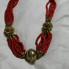 Bright Red Plastic Bead and Ornate Gold Toned Bead, Multi Strand Necklace, Costume Jewelry, Fashion Accessory This is such a nice find.  Very decorative and collectible.  Priced to sell. Check out our shop for monthly specials. We have a variety of items for every taste. Combine several of our items together to save on shipping. If you have any questions please do not hesitate to ask. I will ship outside of the US, just request a quote. Happy Shopping. I will work around the priority mail price. Traditional Red Beaded Necklaces With Round Beads, Traditional Red Beaded Necklaces, Traditional Red Beaded Necklace, Festive Red Coral Necklace, Large Red Beads For Jewelry Making, Adjustable Red Beaded Necklace For Celebration, Festive Round Beaded Costume Jewelry Necklaces, Red Beaded Necklaces For Celebration, Gold Large Red Coral Beads