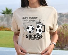 Soccer Mama Shirt, Hot Mess Always Stressed Shirt, Mother's Day Shirt, Soccer Mama Shirt, Gift For Mama, Sports Mama Shirt, Game Day Tee Don't hesitate to contact us if you have any questions about colors, sizes, and personalization's.  *Our processing time is 1-2 business days and we're located in Texas, US. *We use high quality DTF Printing to print the designs on an iron-on vinyl. To Order: Select a size, color, and add personalization (if applicable) before adding to your cart.  How to Take Care? -Please DO NOT iron over the design. -Turn the shirt inside out before washing with warm water and gently cycle. -NO dry cleaning.  Returns or exchanges are not accepted as the items are made-to-order. Please contact us if you have any questions or concerns. Soccer Mama Shirt, Hot Mess, Soccer Shirts, Iron On Vinyl, Mothers Day Shirts, Mama Shirt, Mothers Day, Soccer, Gender Neutral