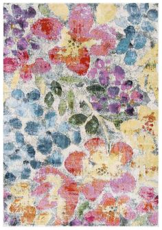 an abstract floral rug with multicolored flowers and leaves on the bottom half of it