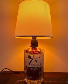 Handmade lamp made with recycled Roku gin bottle (orange light version). Excellent gift and decorative idea for your home. Customizable to your choice. Roku Gin, Gin Bottle, Handmade Lamp, Gin Bottles, Handmade Lamps