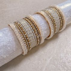 2 Small stacks of antique gold, clear crystal detail and pretty ivory shades finished with these stunning Clear beaded High Edge bangles Ready to Ship with gift boxing.