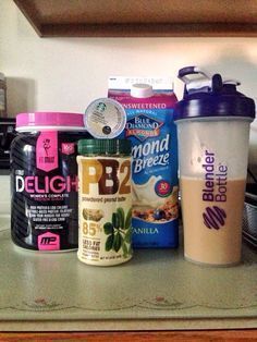 the contents of a blender sitting on top of a counter next to a microwave