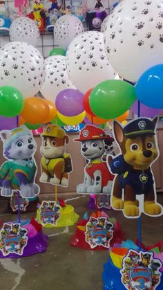 paw patrol birthday decorations and balloons in a store