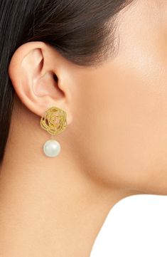 Glossy imitation pearls swing below glinting roses on these drop earrings with a convenient clip-on closure. Style Name:Karine Sultan Flower Swirl Pearl Drop Clip-On Earrings. Style Number: 6172621. Pewter Metal, 24kt Gold, Clip Earrings, Pearl Size, Pearl Drop, Clip On Earrings, Freshwater Pearls, Swirl, Silver Earrings