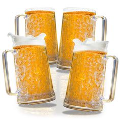 four beer mugs filled with liquid on top of each other