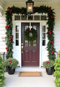 the front door is decorated for christmas with wreaths and poinsettias