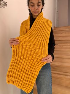 Oversized Chunky hand  Knitted Scarf for autumn/winter in yellow. This knit scarf is a stunning piece of winter wear. Merino deluxe wool and acrylic yarn  increases the thickness and warmth, it is hand knitted in yellow. The scarf is so simple to pair with your favorite outfits and it is sure to be your favorite go-to scarf of the winter! The scarf on the photo is : Length: 86 in. (215 cm) Width : 8.7 in. (22 cm) Material: Wool/Acrylic (50:50) The scarf makes a wonderful gift. Give it as gifts t Handknit Scarf, Hand Knitted Scarf, Hand Knit Scarf, Handmade Scarves, Oversized Scarf, Knitting Inspiration, Knit Scarf, Winter Wear, 50 50