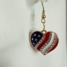 Honor your patriotism with my collection of the American Flag in various shapes. Metallic gold flags hang at 1 to 1 /2 inches from earlobe with a width of 2mm. Goldplated Sterling silver hooks or studs. Stainless steel (hypoallergic nickol color) flags hang at 1 inche from earlobe iwth a width of 1 3/4 mm. Sterling Silver hooks. Collection consist of hearts, rhinestone hearts, stars,and rhinestone flags. Great for Memorial Day, July 4th and anytime you enjoy showing your support of your country. Patriotic Earrings For 4th Of July, Patriotic 4th Of July Earrings, Patriotic Adjustable Dangle Jewelry, Patriotic American Flag Jewelry For Independence Day, Nickel Free Dangle Jewelry For 4th Of July, Silver Jewelry For 4th Of July Gift, Silver Jewelry Gift For 4th Of July, Independence Day Gift Dangle Earrings, Independence Day Dangle Earrings Gift